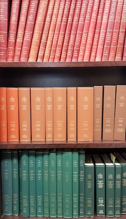 books of annual volumes on shelves