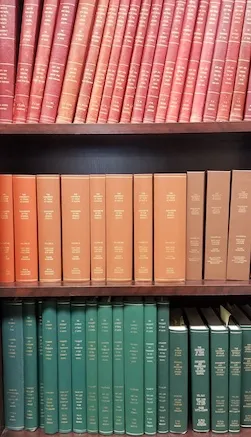 books of annual volumes on shelves